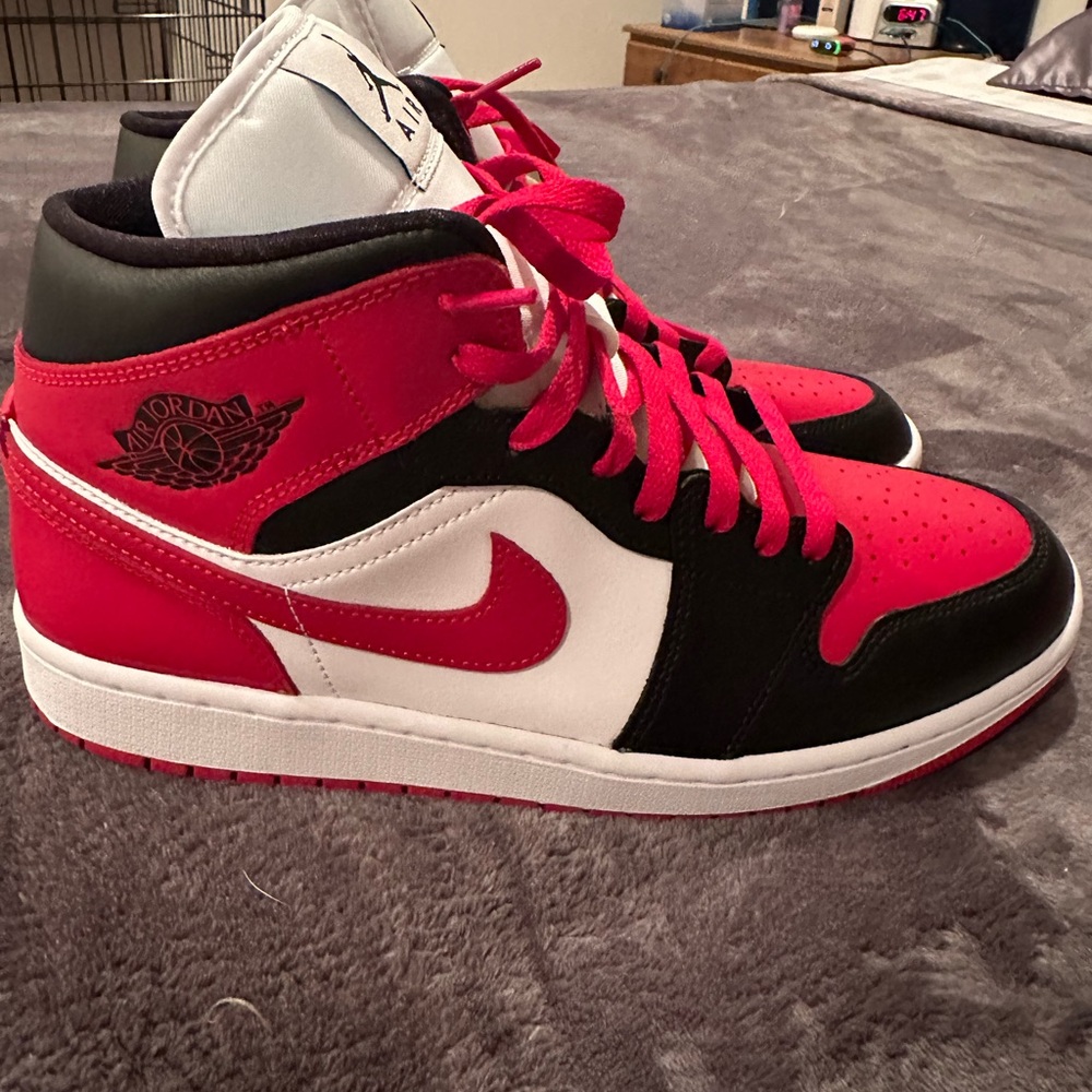 Air Jordan 1 Red and Black Mid Sneakers